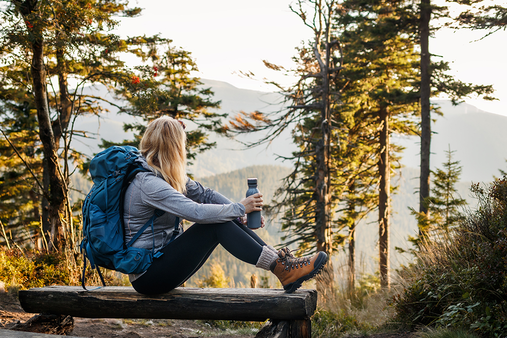 hiker drinking electrolyte beverage