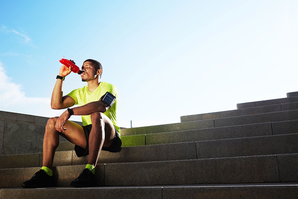 man drinking a functional beverage