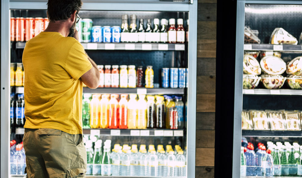 a man shopping for drinks